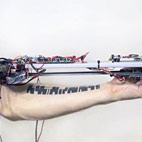 Russian Artist Invents Robot That Makes Music By Reading Tattoos
