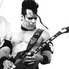 Key to Unique Guitar Sound Is in 'How You Hold Your Guitar,' Misfits' Doyle Explains